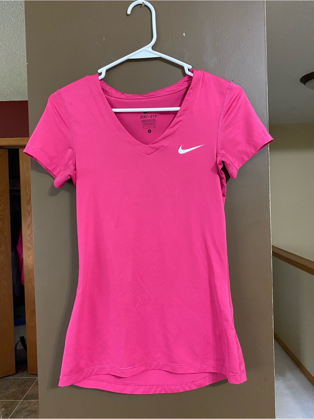 Nike Women's V-Neck Dri-FIT Tee in Pink
